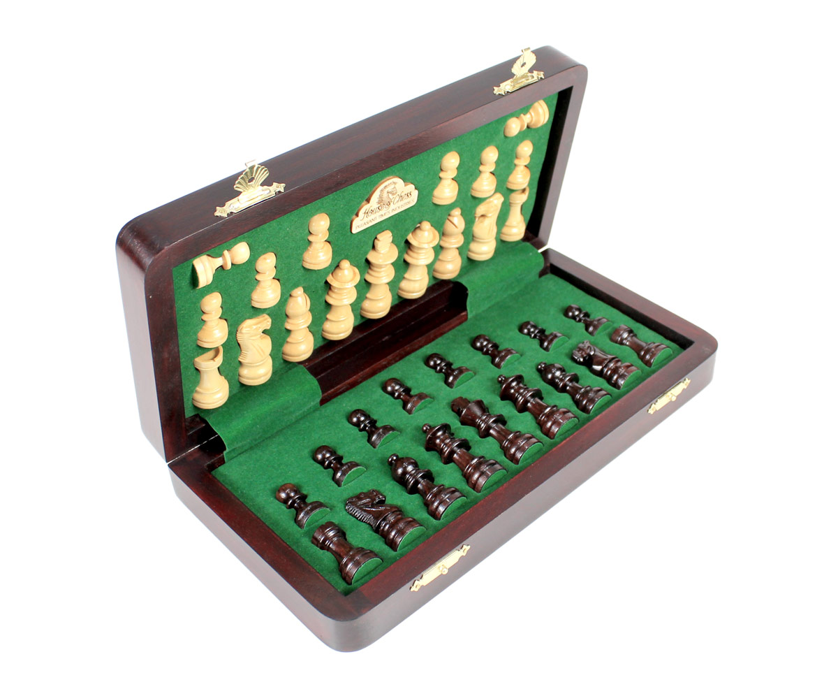 Chess pieces fitted in special inserts made according to the shape of the chess pieces.